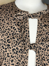 Load image into Gallery viewer, Wild For Bows Leopard Print Tie Front Top
