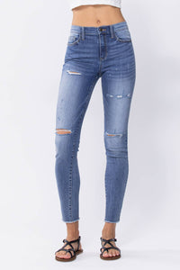 Distressed Mid Rise Skinny Jeans